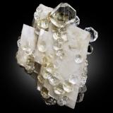 Fluorite on Calcite<br />Hexigten Banner (Kèshíkèténg Qí), Chifeng (Ulanhad), Inner Mongolia Autonomous Region, China<br />14 x 11 x 16 cm / main crystal: 4 cm<br /> (Author: MIM Museum)