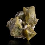 Londonite<br />Ambatomigaby pegmatite, Ampanivana, Andrembesoa, Betafo District, Vakinankaratra Region, Madagascar<br />5.5 x 5 x 3 cm / main crystal: 3.7 cm<br /> (Author: MIM Museum)