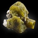 Londonite<br />Ambatomigaby pegmatite, Ampanivana, Andrembesoa, Betafo District, Vakinankaratra Region, Madagascar<br />5.5 x 5 x 3 cm / main crystal: 3.7 cm<br /> (Author: MIM Museum)