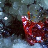 Dufrenoysite, Realgar<br />Lengenbach Quarry, Fäld, Binn Valley (Binntal), Wallis (Valais), Switzerland<br />6 x 4 mm<br /> (Author: Volkmar Stingl)