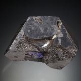 Alabandite with Graphite and Zoisite (variety tanzanite)Merelani Hills, Lelatema Mountains, Simanjiro District, Manyara Region, Tanzania7.5 x 4.5 x 5 cm / main crystal: 7.2 cm. (Author: MIM Museum)