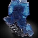 Fluorite, Sphalerite, Baryte<br />Denton Mine, Rosiclare formation, Goose Creek Mine group, Harris Creek Sub-District, Hardin County, Illinois, USA<br />12.6 x 10 x 11.8 cm / main crystal: 7.2 cm<br /> (Author: MIM Museum)
