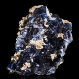 Fluorite, Calcite<br />Denton Mine, Rosiclare formation, Goose Creek Mine group, Harris Creek Sub-District, Hardin County, Illinois, USA<br />22 x 19 x 12 cm / main crystal: 5.4 cm.<br /> (Author: MIM Museum)