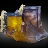 Fluorite with Chalcopyrite inclusions, Calcite<br />Denton Mine, Rosiclare formation, Goose Creek Mine group, Harris Creek Sub-District, Hardin County, Illinois, USA<br />8.6 x 7.5 x 10.5 cm / main crystal: 8.8 cm<br /> (Author: MIM Museum)