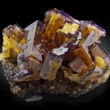 Fluorite<br />Minerva I Mine, Rosiclare formation, Ozark-Mahoning group, Cave-in-Rock Sub-District, Hardin County, Illinois, USA<br />13 x 18 x 15 cm / main crystal: 7.4 cm.<br /> (Author: MIM Museum)