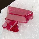 Spinel (twinned) on Calcite<br />Pein-Pyit, Mogok Township, Pyin-Oo-Lwin District, Mandalay Region (Mandalay Division), Myanmar (Burma)<br />2.6 × 2.4 × 1.8 cm<br /> (Author: Jordi Fabre)