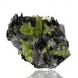 Graphite with Diopside and Mesolite<br />Karo Pit, D-Block Mine, Merelani Hills, Lelatema Mountains, Simanjiro District, Manyara Region, Tanzania<br />4 x 3 x 2.5 cm / main crystal: 0.8 cm<br /> (Author: MIM Museum)
