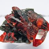 Rhodochrosite with ManganiteMina N'chwaning I, Zona minera N'Chwaning, Kuruman, Kalahari manganese field (KMF), Provincia Septentrional del Cabo, Sudáfrica2.5 × 1.9 × 1.2 cm (Author: Jordi Fabre)