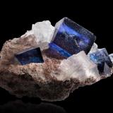 Halite with Sylvite<br />Kerr McGee Mine, 10th ore zone, 'frozen blue' seam, Carlsbad Potash District, Eddy County, New Mexico, USA<br />19 x 14 x 11 cm / main crystal: 8.2 cm.<br /> (Author: MIM Museum)