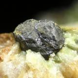 Uraninita<br />Mina Diéresis, Puerto del Cabril, Hornachuelos, Comarca Valle Medio del Guadalquivir, Córdoba, Andalucía, España<br />cristal 0.5 cm<br /> (Autor: Cesar M. Salvan)