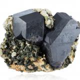 Andradite (variety melanite) with Epidote and PrehniteRegión Kayes, Mali15.5 x 25.5 x 17.5 cm / main crystal: 15.8 cm. (Author: MIM Museum)