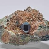 Cuprite on Calcite<br />Mashamba West Mine, Kolwezi District, Lualaba, Katanga Copper Crescent, Katanga (Shaba), Democratic Republic of the Congo (Zaire)<br />3.9 × 2.7 × 2.5 cm<br /> (Author: Jordi Fabre)