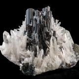 Hübnerite with Quartz and Tetrahedrite<br />Huayllapon Mine (Huallapon Mine), Pasto Bueno, Pampas District, Pallasca Province, Ancash Department, Peru<br />18 x 14 x 14 cm / main crystal: 6 cm.<br /> (Author: MIM Museum)