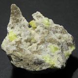 Azufre, calcitaMinas de Azufre, La Serrata, Lorca, Comarca Alto Guadalentín, Región de Murcia (Murcia), España6 x 5,3 x 2,5 cm (Autor: Frederic Varela)