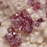 Cinnabar on Quartz<br />Nikitovka deposit, Horlivka (Gorlovka), Horlivka Raion, Donetsk Oblast, Ukraine<br />main crystal size: 0.2 × 0.2 cm<br /> (Author: Jordi Fabre)