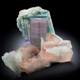 Beryl (variety morganite) with Elbaite and Orthoclase on Albite and 'lepidolite'<br />Sooray prospect, Dara-I-Pech District (Pech District), Kunar Province (Konar), Afghanistan<br />11 x 10 x 10.5 cm / main crystal: 3.5 cm.<br /> (Author: MIM Museum)