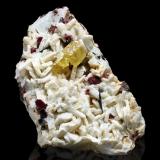 Londonite on Albite and Fluor-liddicoatiteAntsahanana Quarry, Sahatany Valley (Mt. Ibity), Antsirabe II District, Vakinankaratra Region, Madagascar9.5 x 6 x 3 cm / main crystal: 2.1 cm. (Author: MIM Museum)