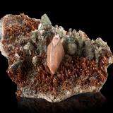 Titanite with Diopside and Grossular (variety hydrogrossular)Bellecombe, Châtillon, Valle de Aosta (Val d'Aosta), Italia9.5 x 6 x 4 cm / main crystal: 2.3 cm. (Author: MIM Museum)