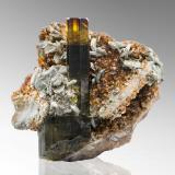 Vesuvianite with Mica (Group) and Grossular (variety hydrogrossular)Alpe delle Frasse, Condove, Val di Susa, Provincia Ciudad metropolitana de Turín, Piamonte (Piemonte), Italia7 x 4 x 6.5 cm / main crystal: 6.4 cm (Author: MIM Museum)