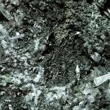 Anglesita, Galena, Fluorita<br />Pedrera Berta, Turó de Can Domènech, Serra de Roques Blanques, Sant Cugat del Vallès-El Papiol, Comarca Vallès Occidental / Baix Llobregat, Barcelona, Cataluña / Catalunya, España<br />Ampliación, cristal mayor 8 mm<br /> (Autor: Carles Millan)