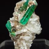 Beryl (variety emerald) on Albite<br />Chivor mining district, Municipio Chivor, Eastern Emerald Belt, Boyacá Department, Colombia<br />Specimen size: 3.4 × 2.3 × 1.1 cm<br /> (Author: Jordi Fabre)