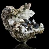 Anatase with QuartzThurdook (Thurdok), Monte Zard, Montes Ras Koh, Distrito Kharan, Balochistan (Baluchistan), Paquistán7 x 6.5 x 8.5 cm / main crystal: 1.7 cm. (Author: MIM Museum)