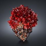 RhodochrositeZona minera N'Chwaning, Kuruman, Kalahari manganese field (KMF), Provincia Septentrional del Cabo, Sudáfrica15 x 18 x 8 cm / main crystal: 2.8 cm. (Author: MIM Museum)