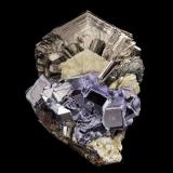 Pyrrhotite with Apatite (Group), Galena and FluoriteDepósito Bairendaba, Hexigten Banner (Kèshíkèténg Qí), Chifeng (Ulanhad), Región Autónoma Mongolia Interior, China9 x 7 x 10.5 cm / main crystal: 7.9 cm. (Author: MIM Museum)