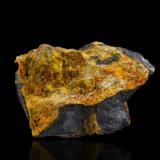 Fourmarierite on UraniniteShinkolobwe, Cinturón de cobre de Katanga, Katanga (Shaba), República Democrática del Congo (Zaire)6.5 x 4.5 x 5 cm / main crystal: 1.3 cm (Author: MIM Museum)