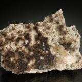 Hydrozincite, Plattnerite, Hemimorphite, CalciteMina Ojuela, Mapimí, Municipio Mapimí, Durango, México5.8 x 3.9 x 1.8 cm (Author: Michael Shaw)