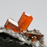 WulfeniteMina Red Cloud, Montes Trigo, Distrito minero Silver, Condado La Paz, Arizona, USAcrystal "V" 7x6 mm (Author: Tobi)