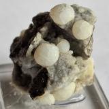 Calcite and Clinoptilolite-Ca<br />Cabezo Negro de Zeneta Volcano, Murcia, Comarca Huerta de Murcia, Region of Murcia (Murcia), Spain<br />2,5 x 2 cm<br /> (Author: Volkmar Stingl)