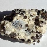Grossular, Quartz (variety chalcedony)<br />Sierra de las Cruces, Sierra Mojada mining district, Municipio Sierra Mojada, Coahuila (Coahuila de Zaragoza), Mexico<br />8,5 x 7 cm<br /> (Author: Volkmar Stingl)