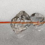 Quartz, RutileHiddenite, Condado Alexander, North Carolina, USA21 x 5 mm (Author: am mizunaka)