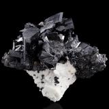 Chevkinite (Subgroup) on Orthoclase and Titanite<br />Tangir Valley, Tangir District, Gilgit-Baltistan (Northern Areas), Pakistan<br />17.5 x 16 x 12 cm / main crystal: 7 cm<br /> (Author: MIM Museum)