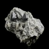 Anatase on AlbiteHardangervidda, Hordaland, Noruega8 x 5.5 x 6.5 cm / main crystal: 2 cm (Author: MIM Museum)