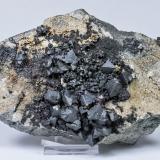 Acanthite with Siderite and Proustite<br />Imiter Mine, Jebel Saghro, Imiter District, Tinghir Province, Drâa-Tafilalet Region, Morocco<br />Specimen size: 14.2 × 10.3 × 5 cm<br /> (Author: Jordi Fabre)