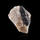 Hibonite<br />Ambatomika, Tranomaro, Amboasary District, Anosy Region, Madagascar<br />5,5 x 4,5 x 4,5 cm<br /> (Author: MIM Museum)