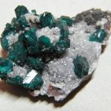 Dioptase on CalciteTsumeb Mine, Tsumeb, Otjikoto Region, Namibia50x35mm (Author: Heimo Hellwig)