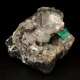 Beryl (variety emerald), Calcite, Pyrite<br />La Pita mining district, Municipio Maripí, Western Emerald Belt, Boyacá Department, Colombia<br />7cm across<br /> (Author: Fiebre Verde)