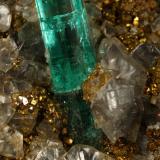 Beryl (Var. Emerald), Dolomite, Pyrite<br />Chivor mining district, Palo Arañado Mine, Municipio Chivor, Eastern Emerald Belt, Boyacá Department, Colombia<br />63x45x15mm, main xl=10mm<br /> (Author: Fiebre Verde)