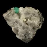 Beryl (Var. Emerald), Calcite, Pyrite<br />Muzo mining district, La Pava Mine, Quípama, Municipio Muzo, Western Emerald Belt, Boyacá Department, Colombia<br />85x62x64mm, xl=8x9mm<br /> (Author: Fiebre Verde)