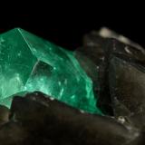 Beryl (variety emerald), Calcite, Pyrite<br />La Pita mining district, Cunas Mine, Municipio Maripí, Western Emerald Belt, Boyacá Department, Colombia<br />50x50x45mm, xl=11x7mm<br /> (Author: Fiebre Verde)