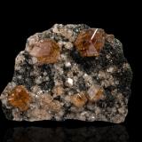Grossular<br />Jeffrey Mine, Asbestos, Les Sources RCM, Estrie, Québec, Canada<br />10,5	x	9,0	x	6,5	cm<br /> (Author: MIM Museum)
