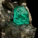 Beryl (variety emerald), Calcite, Dolomite, Pyrite<br />Chivor mining district, Municipio Chivor, Eastern Emerald Belt, Boyacá Department, Colombia<br />44x34x39mm, xl=7mm<br /> (Author: Fiebre Verde)