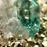 Beryl (variety emerald), Calcite, Pyrite<br />Chivor mining district, El Acuario Mine, Municipio Chivor, Eastern Emerald Belt, Boyacá Department, Colombia<br />92x41x52mm, main xl=4mm<br /> (Author: Fiebre Verde)