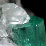 Beryl (variety emerald), Calcite<br />La Pita mining district, Polveros Mine, Municipio Maripí, Western Emerald Belt, Boyacá Department, Colombia<br />41x52x59mm, xl=26x9mm<br /> (Author: Fiebre Verde)