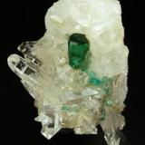 Beryl (variety emerald), Quartz<br />Peñas Blancas Mine, Municipio San Pablo de Borbur, Western Emerald Belt, Boyacá Department, Colombia<br />40mm across, xl=7mm<br /> (Author: Fiebre Verde)