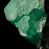 Beryl (variety emerald), Calcite<br />Muzo mining district, Western Emerald Belt, Boyacá Department, Colombia<br />58x31x34mm, xl aggregate=25x8mm<br /> (Author: Fiebre Verde)