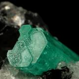 Beryl (variety emerald), Calcite<br />Muzo mining district, Western Emerald Belt, Boyacá Department, Colombia<br />58x31x34mm, xl aggregate=25x8mm<br /> (Author: Fiebre Verde)